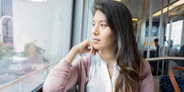 lady contemplating a past life regression session
